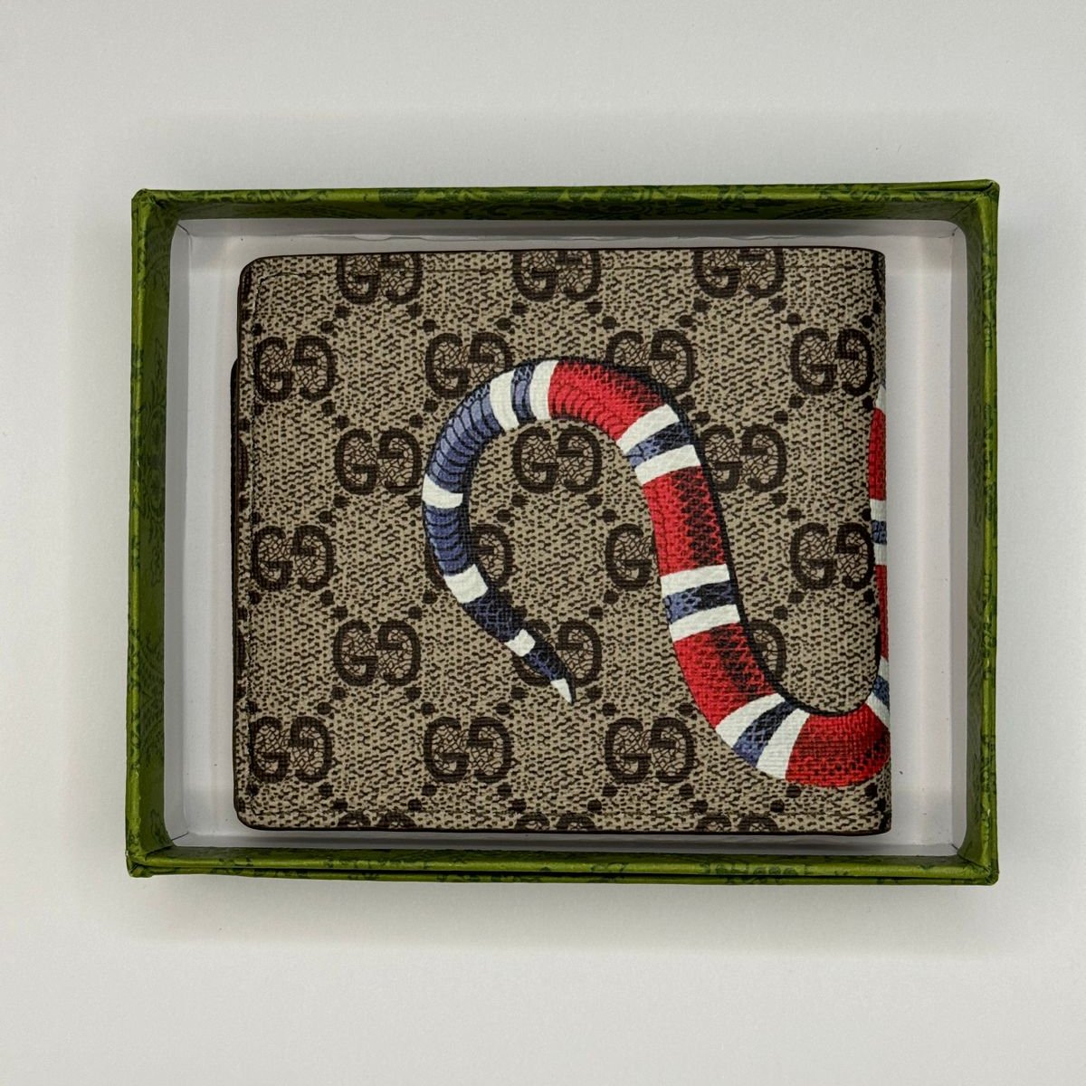 CARTERA GCCI NEGRA ESTAMPADO DE SERPIENTE