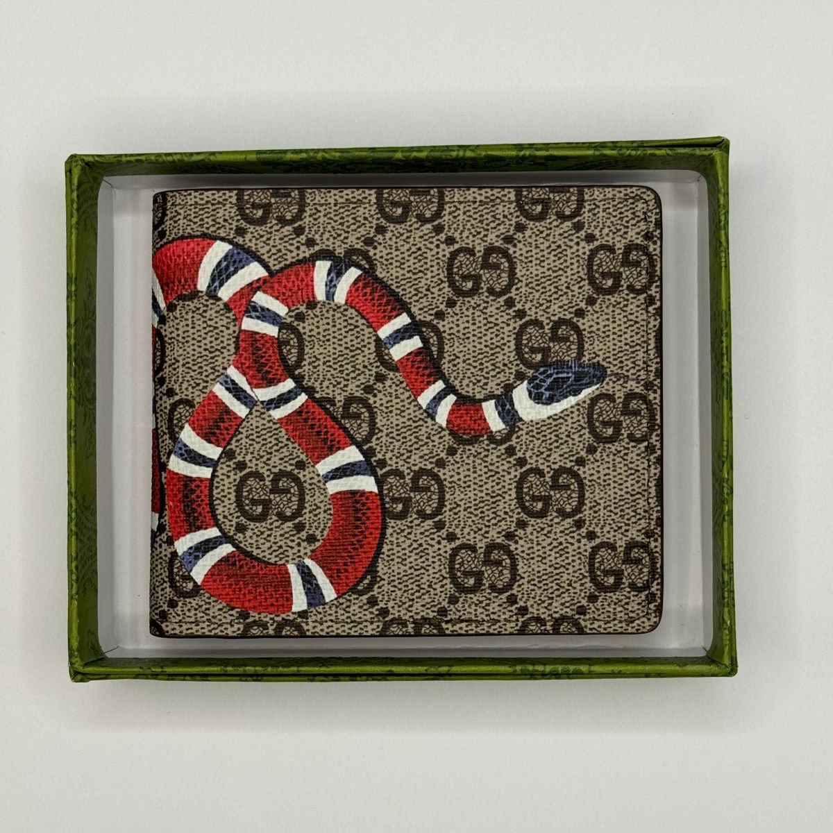 CARTERA GCCI NEGRA ESTAMPADO DE SERPIENTE